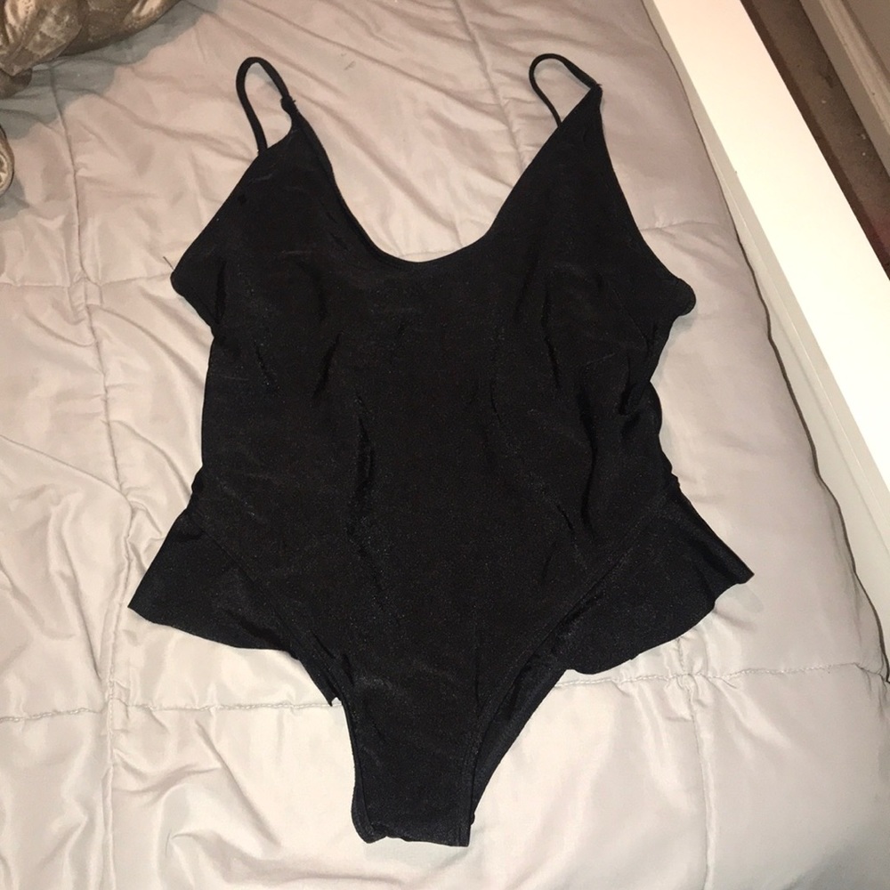 Plunging one piece with ruffles